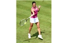 BIRMINGHAM, ENGLAND - JUNE 09:  Francesca Schiavone of Italy returns a shot from Jie Zheng of China on day one of the AEGON Classic Tennis Tournament at Edgbaston Priory Club on June 9, 2014 in Birmingham, England.  (Photo by Tom Dulat/Getty Images)